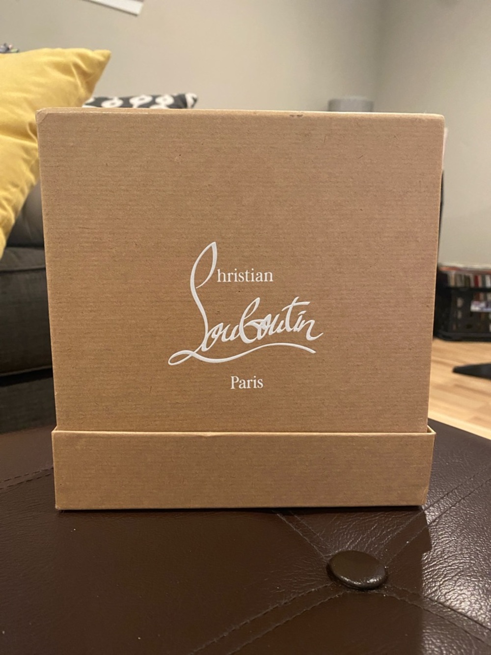 Christian Louboutin Brown Box with White Logo.
